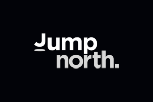 A black logo which reads Jump North. in white text.
