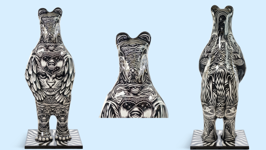 An image which shows the front, back and close up head of a bear sculpture designed by Tom J Newell for the Bears of Sheffield. The bear features an an all-over black and white design and is inspired by psychedelia and vinyl records.
