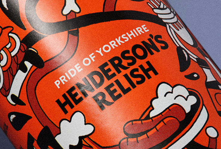 A bottle of Henderson's Relish with a special design on the label. In the orange and black colour scheme, it has wavy lines flowing towards each other leading to delicious Yorkshire foods.